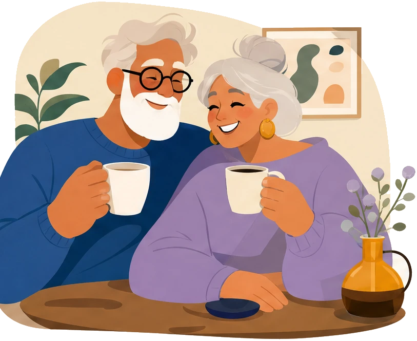 An older couple laughing together over warm mugs of coffee